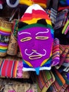 Background of colored fabrics and a traditional mask Royalty Free Stock Photo