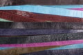 Background - colored leather belts. Royalty Free Stock Photo