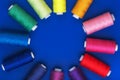 Background with colored sewing thread red blue Royalty Free Stock Photo