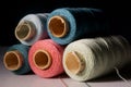 Background with colored sewing threads on spools Royalty Free Stock Photo