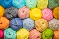 Background from colored yarn. Balls of thread close-up. Materials for needlework. Rack with yarn in the store. Shelf Royalty Free Stock Photo