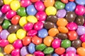 Background of colorful button shaped candies filled with chocolate Royalty Free Stock Photo