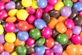 Background of colorful button shaped candies filled with chocolate Royalty Free Stock Photo