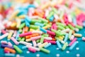 Background of colorful sprinkles, jimmies for cake decoration