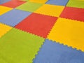 Background of Colorful Tiled Jigsaw Mats for Yoga or Playground