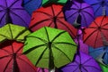 A background of colorful and wrinkled umbrellas