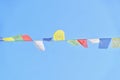 Colourful Tibetan Prayer Flags Isolated Against Blue Skies Royalty Free Stock Photo