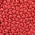 Background composed of many small red hearts