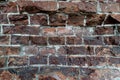 Background of a concave wall of old red brick