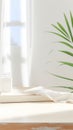 background consisting of a green fern leaf, a white board on the table Royalty Free Stock Photo