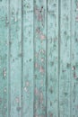 Old blue green door with peeling paint Royalty Free Stock Photo