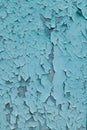 Background consisting of old blue green door with peeling paint Royalty Free Stock Photo