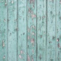 Old blue green door with peeling paint Royalty Free Stock Photo