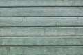 Background consisting of weathered green grey boards