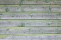 Background consisting of weathered green grey boards