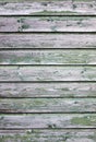 Background consisting of weathered green grey boards