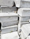 Background construction Materials. Photo heap bricks. Gray texture, stone