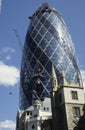 Swiss Re and Church spires London UK 2003 Royalty Free Stock Photo