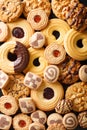 Background of cookies assorted close-up. Vertical top view Royalty Free Stock Photo