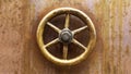 Copper background with brass control knob Royalty Free Stock Photo