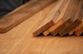 Seven plank woods strack on plywood board. Royalty Free Stock Photo