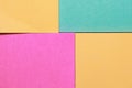 Background created with four different color sticky note pads