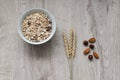 Background with crispbread of wheat grains and ears of wheat on a wooden background. Healthy food.