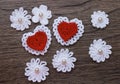 Background with crochet lace flowers and hearts