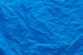 Background of a crumpled blue paper