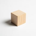 Background. The cube has smooth surfaces and visible wood grain Royalty Free Stock Photo