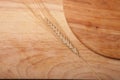 Background of cutting boards spikelet of wheat