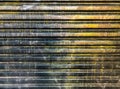Store dirty metal door with gold splashes Royalty Free Stock Photo