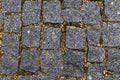 Background of dark, ancient cobblestone. Texture with a cobblestone pattern