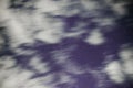 Background of dark-blue night sky with countless twinkle stars and moving white clouds upon on it Royalty Free Stock Photo