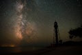 Background of dark-blue night sky with countless twinkle stars and moving white clouds upon on it Royalty Free Stock Photo