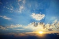 Background of dark-blue night sky with countless twinkle stars and moving white clouds upon on it Royalty Free Stock Photo