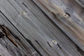 Background dark old cracked wooden boards with rusty nails close up Royalty Free Stock Photo