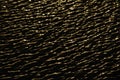 Background of dark wavy sand patterns with evening sun reflections Royalty Free Stock Photo