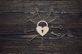 Background with decorative lock-heart and antique keys on wooden Royalty Free Stock Photo