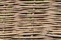 Background of decorative rustic village wicker fence Royalty Free Stock Photo