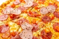 Background with delicious classic italian Pizza Pepperoni with sausages and cheese mozzarella Royalty Free Stock Photo