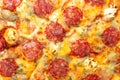 Background with delicious classic italian Pizza Pepperoni with sausages and cheese mozzarella Royalty Free Stock Photo