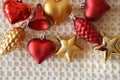 Background for the design of a Merry Christmas and a Happy New Year. Winter holidays. red and golden Christmas tree toys on a cozy Royalty Free Stock Photo