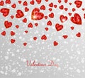 Background from diamond gemstones, in a shape of heart, on a light background for St. Valentine`s Day, a love holiday