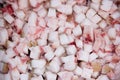 Background diced pork fat for cooking smaltse. Cubed pork fat being rendered to make scratchings. Royalty Free Stock Photo