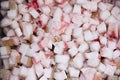 Background diced pork fat for cooking smaltse. Cubed pork fat being rendered to make scratchings. Royalty Free Stock Photo