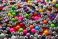 Background from different colored beads with numbers and symbols Royalty Free Stock Photo