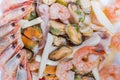 Background of different cooked seafoods on dish, fragment close-up