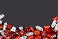 Background with different roleplaying RPG dice at bottom of dark black background with blank copy space Royalty Free Stock Photo