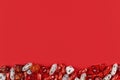 Background with different roleplaying RPG dice at bottom of red background with copy space Royalty Free Stock Photo